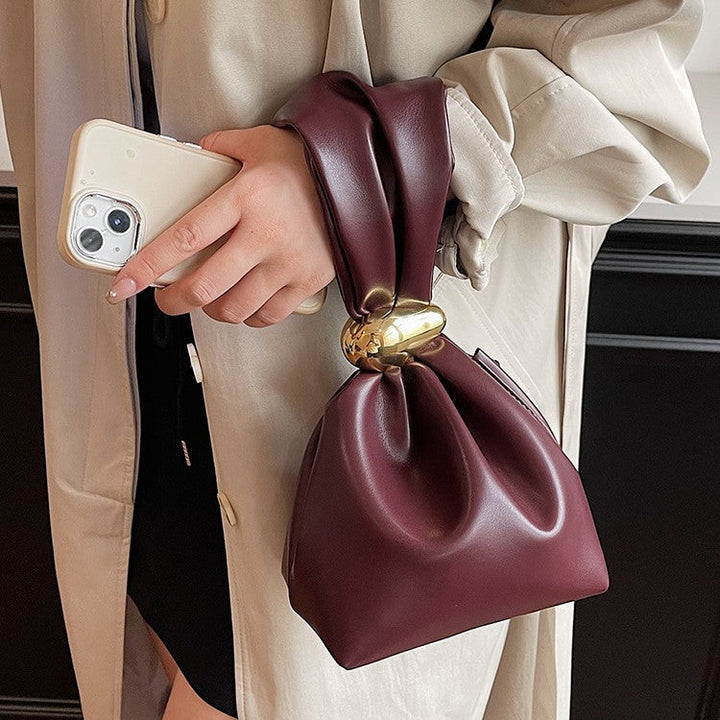 Nord Taschen | Vegane Leder Raffung Clutch Tasche mit goldener Ringgriff