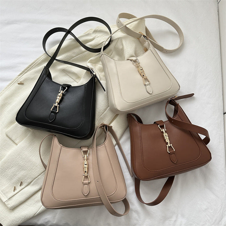 Nord Taschen | Umhängetasche für Damen - Schlichte Schultertasche mit stilvollem Design und praktischer Schnalle