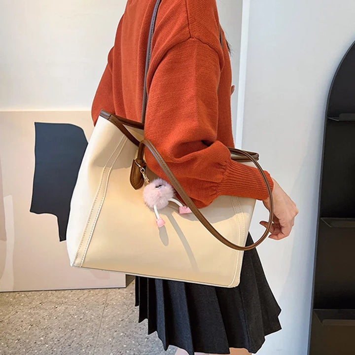 Nord Taschen | Handtasche für Damen - Praktisches Design mit süßem Anhänger und geräumigem Innenraum
